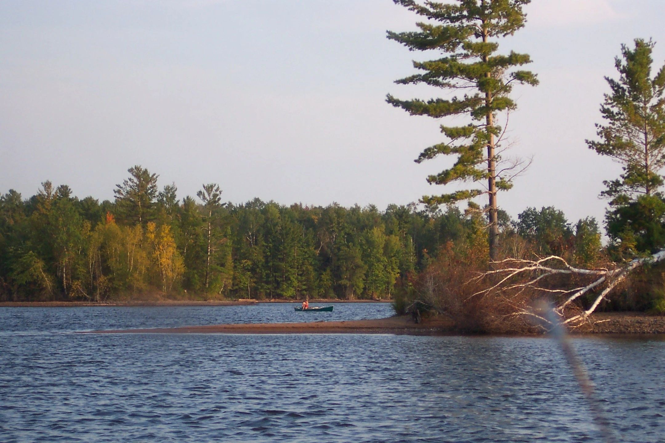 Canoe on the lake in autumn